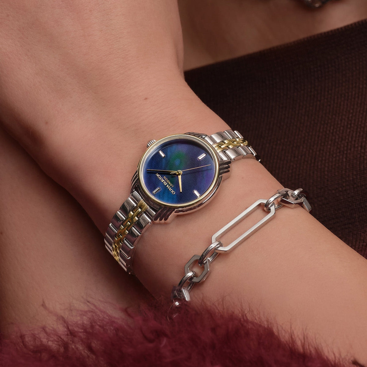Wrist with watch and bracelet.

