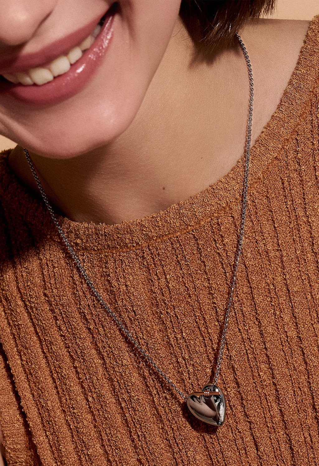 The Olivia Burton Knot Heart Necklace, a silver stainless steel necklace from Olivia Burton, at OD’s Jewellers in St Helens.