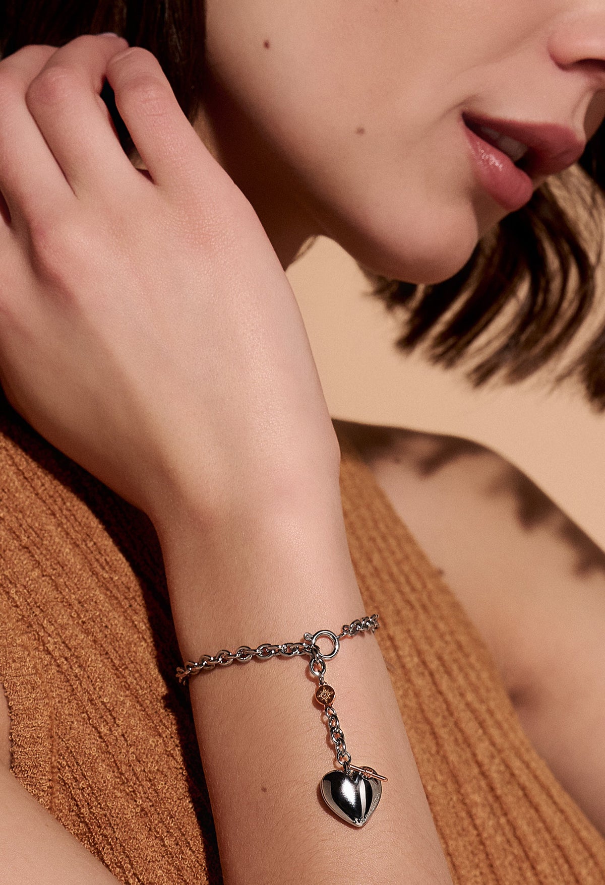 The Olivia Burton Knot Heart Bracelet, a silver stainless steel bracelet from Olivia Burton, available at OD’s Jewellers in St Helens.
