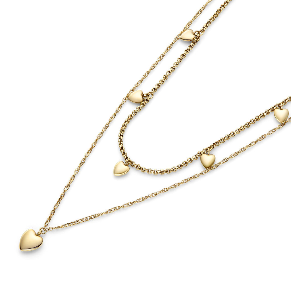Gold layered necklace with heart pendants.