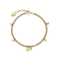 Gold heart charm bracelet on a white background.