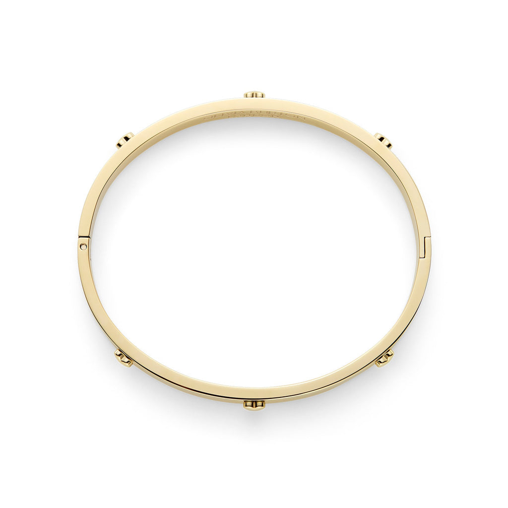 Gold-colored bangle with stud details.