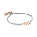 Nomination bracelet featuring a double clover charm, one in rose gold PVD, showcasing adjustable chain.