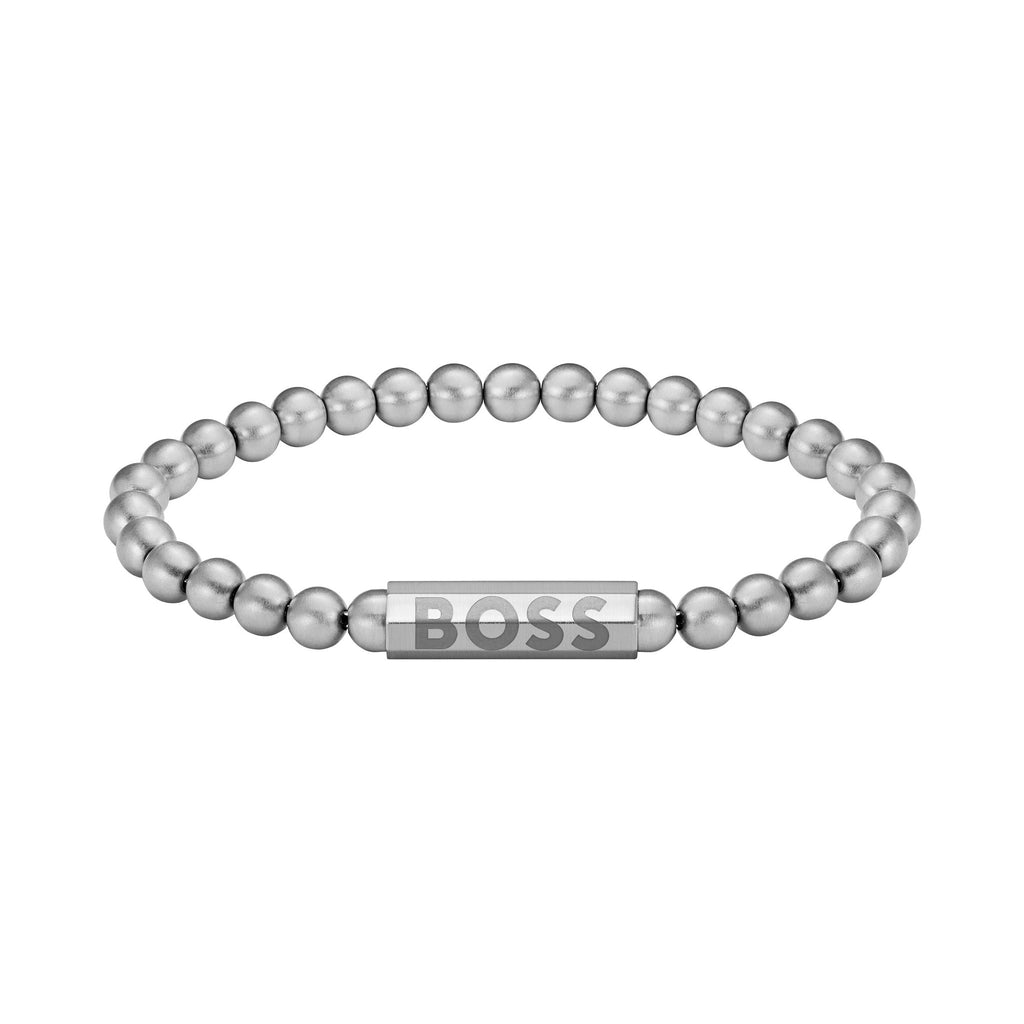 Close-up of a BOSS Sphere bracelet, showcasing the stainless steel bead design and engraved logo.