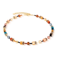Beaded necklace with colorful, square beads and gold connectors.
