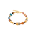 A colorful beaded bracelet with gold chain detail.

