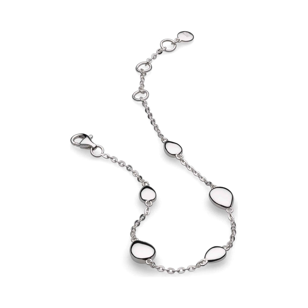 Silver Coast Pebble bracelet by Kit Heath, featuring white pebble stations, on a white background.