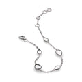 Silver Coast Pebble bracelet by Kit Heath, featuring white pebble stations, on a white background.