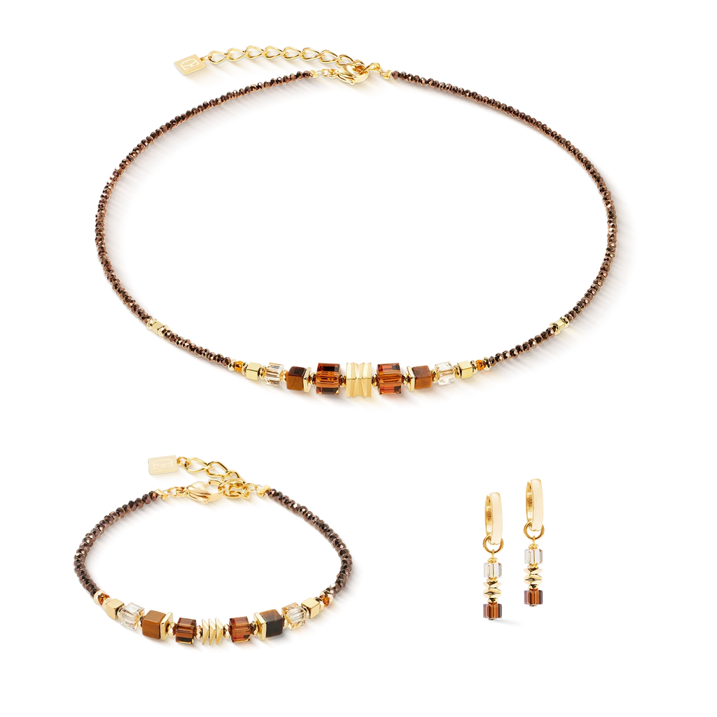 Gold and brown beaded jewelry set with necklace, bracelet, and earrings.