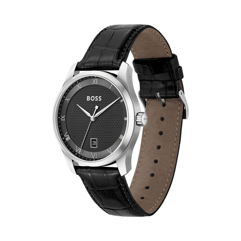 Close-up of BOSS Principle watch showcasing black textured dial, stainless steel case, and black leather strap.