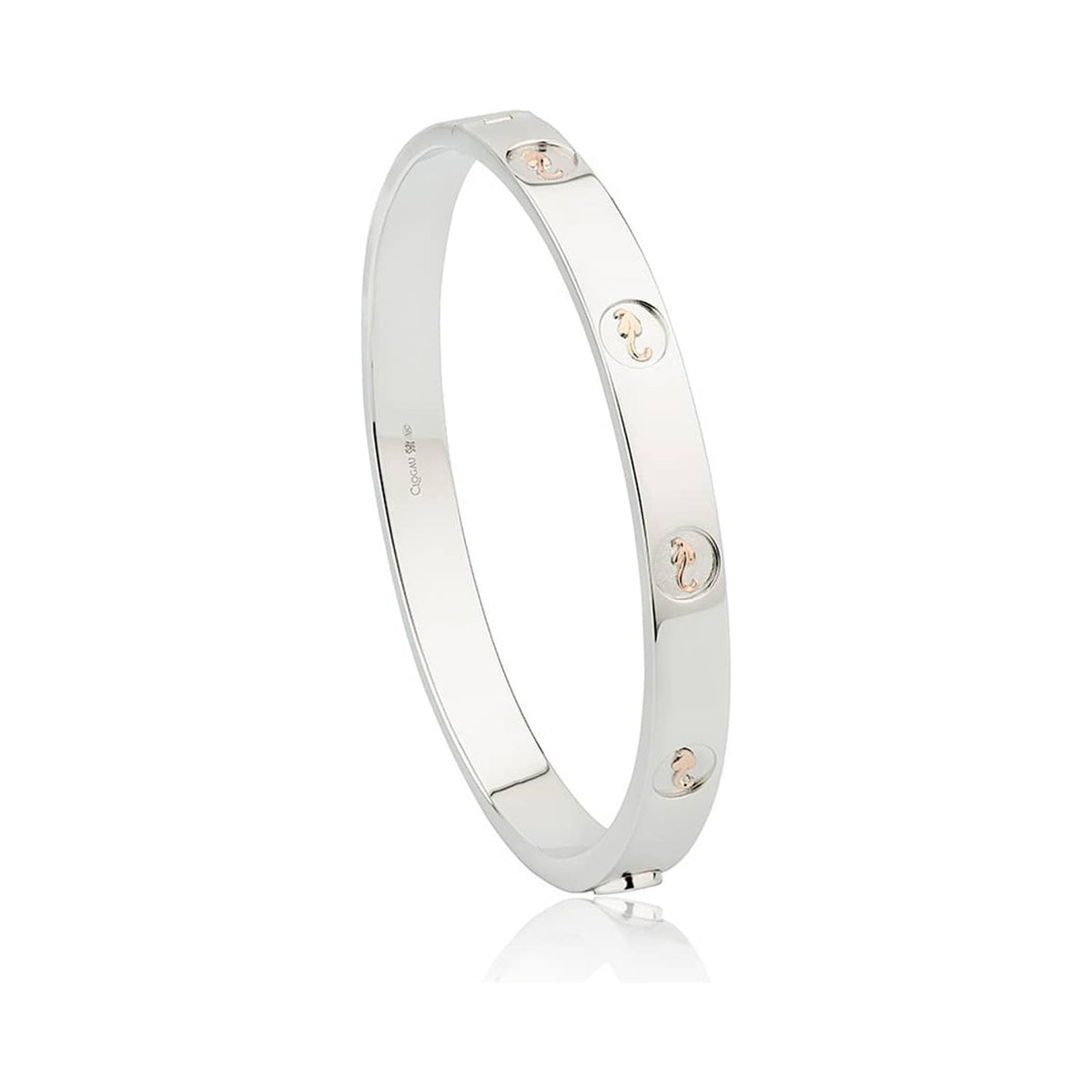 Sterling silver Clogau Insignia bangle from the Heritage Collection, featuring rose gold Welsh dragon emblems in circular
