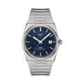 Tissot PRX Powermatic 80 watch showcasing the brushed steel bracelet and deep blue textured dial. Tissot 1853 branding.