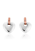 Sterling silver Clogau Cariad heart stud earrings with rose gold detail and diamond, showcasing jewelry design.