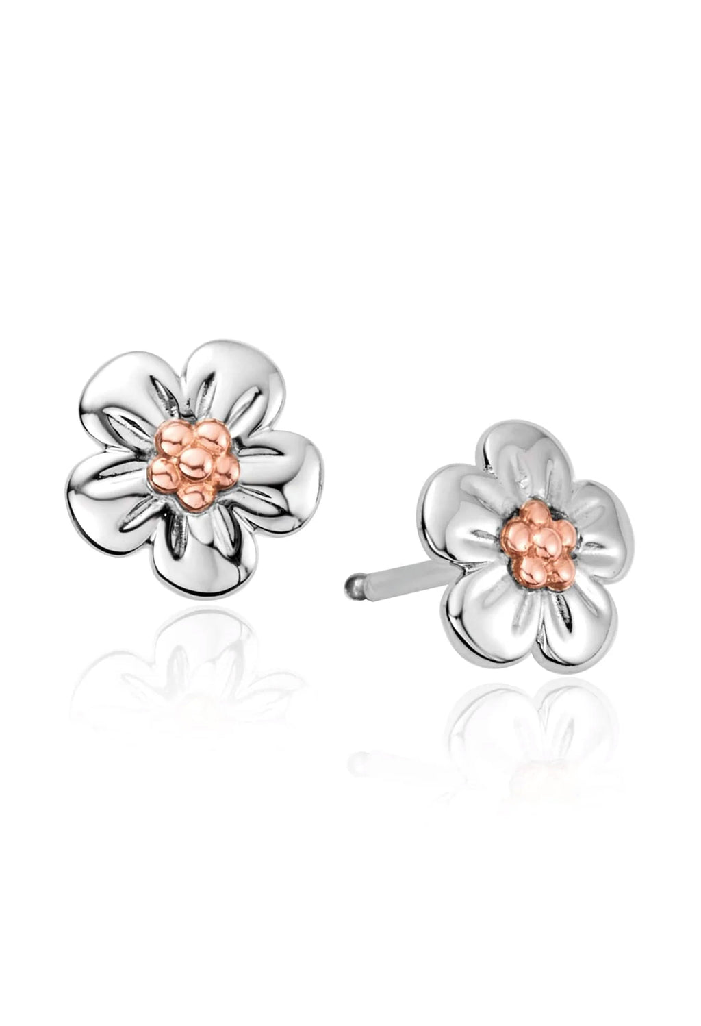 Clogau Forget Me Knot earrings. Sterling silver flower studs with rose gold center detail showcase nature-inspired design.