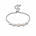 Silver and gold flower bracelet.