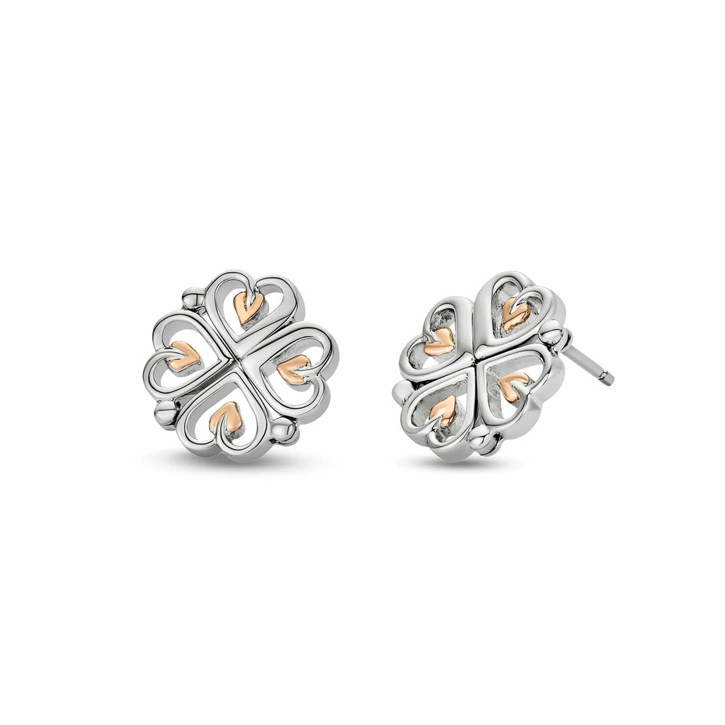 Silver clover earrings with gold hearts.