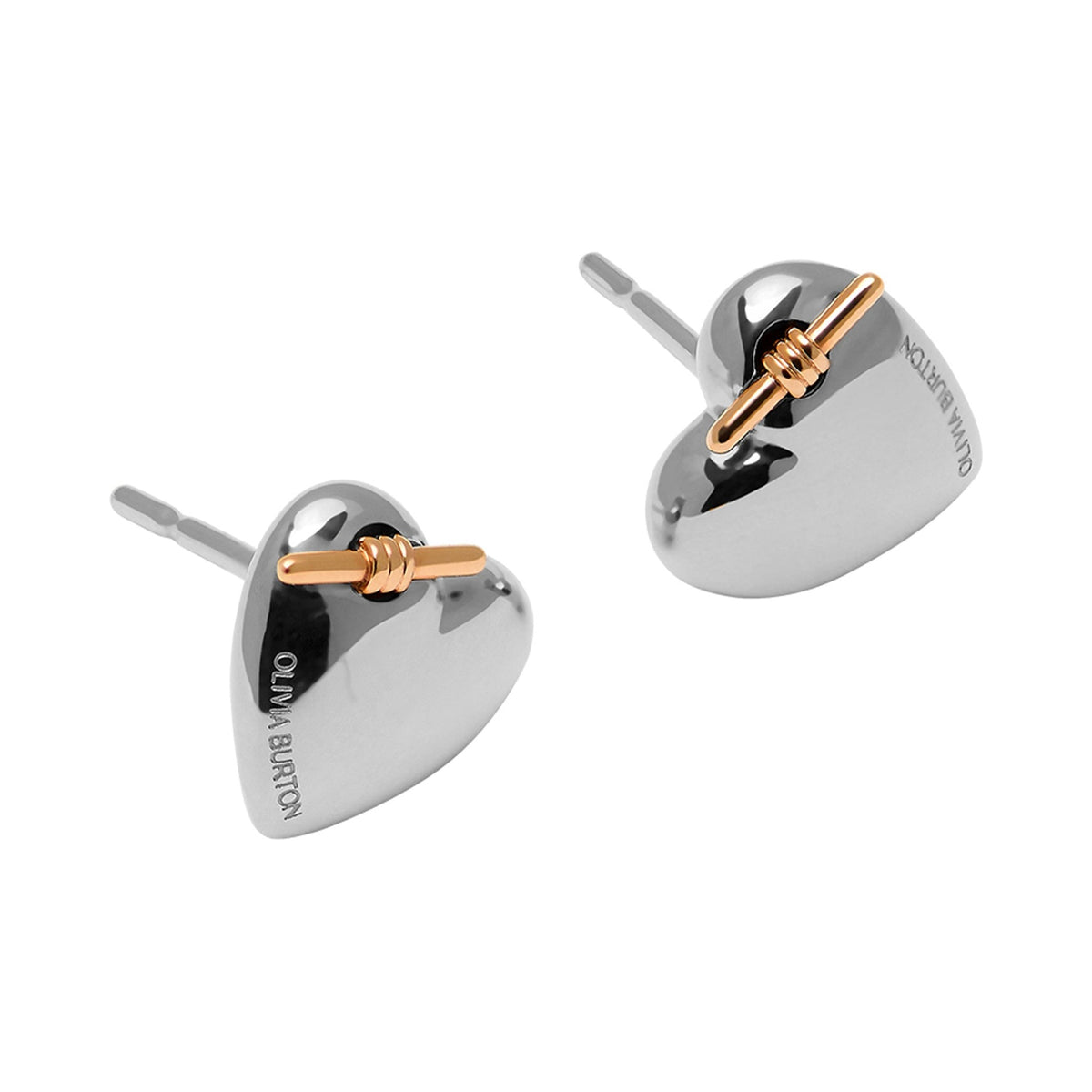 Stainless steel heart earrings featuring a knot design; Olivia Burton branded jewelry.