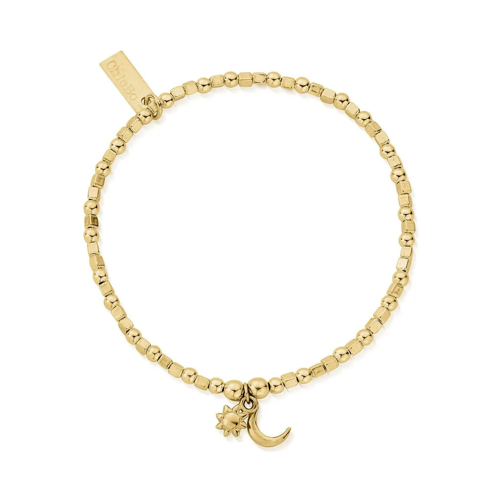 ChloBo Mini Cube bracelet, close-up. Gold-plated sun and moon charms detail the fine jewelry piece.
