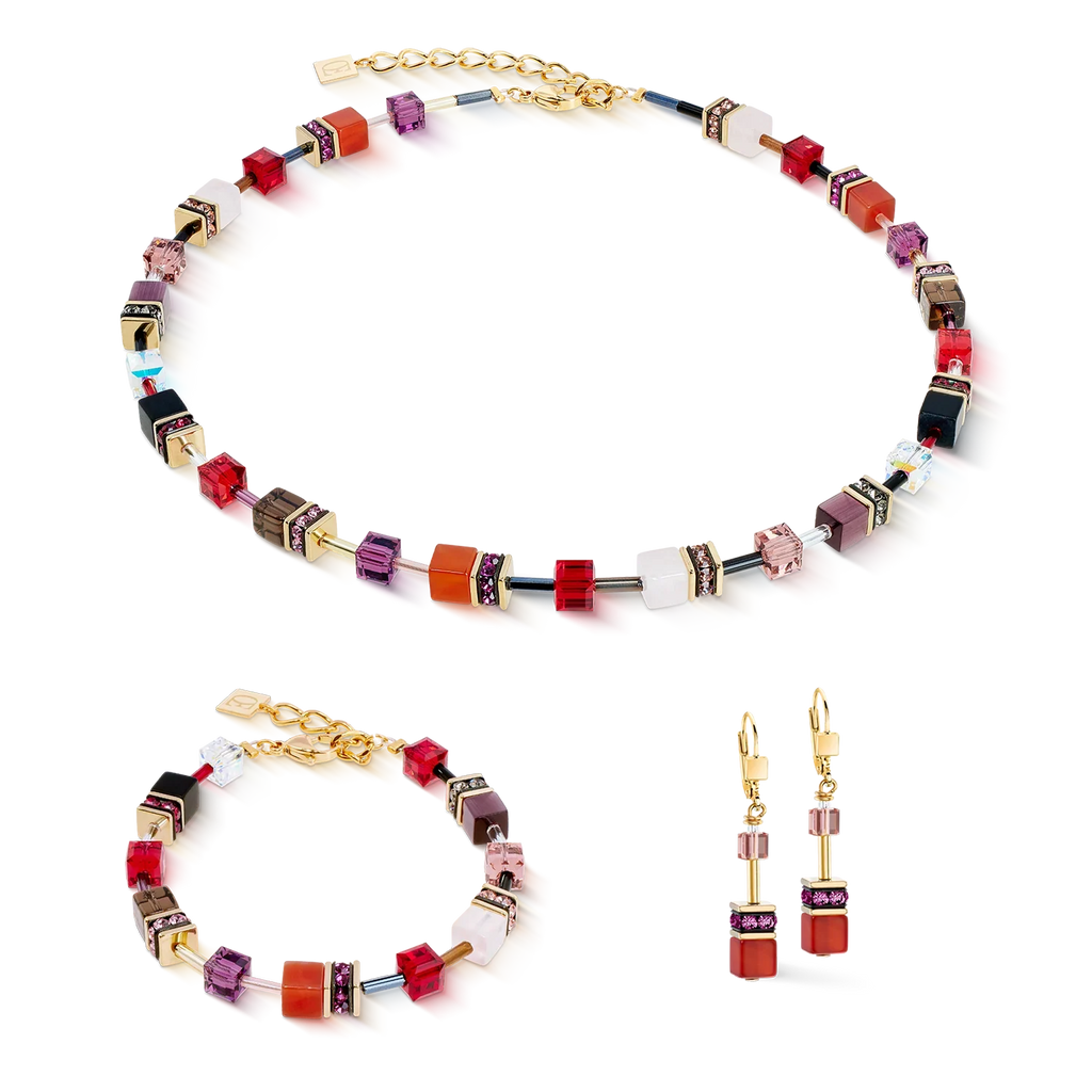 Necklace and earring set with colorful cube-shaped beads and gold accents.
