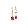 Pair of gold earrings with pink and red cubes.