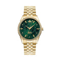 Gold watch with green face.