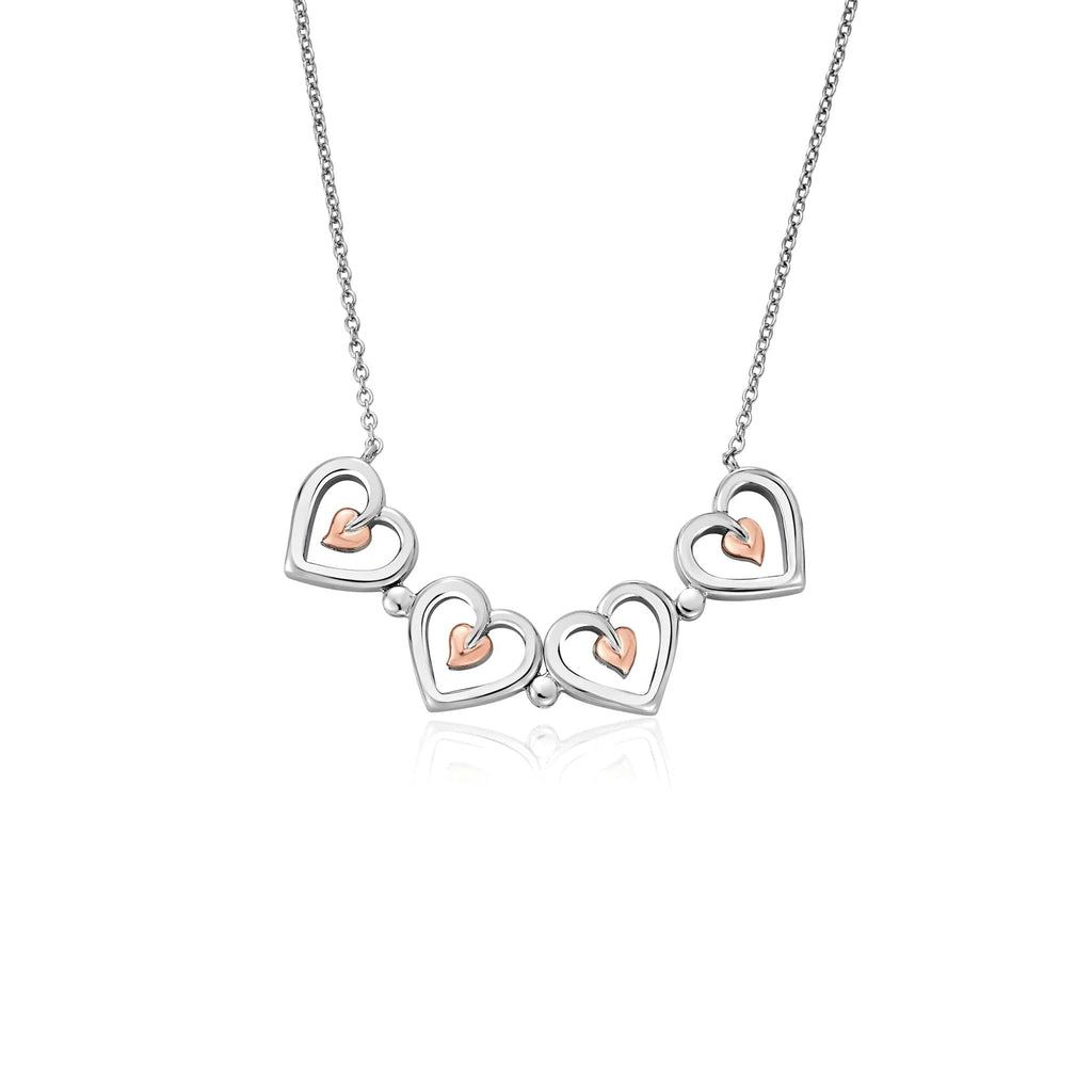 Clogau Tree Of Life heart pendant necklace. Sterling silver Celtic design with rose gold heart.