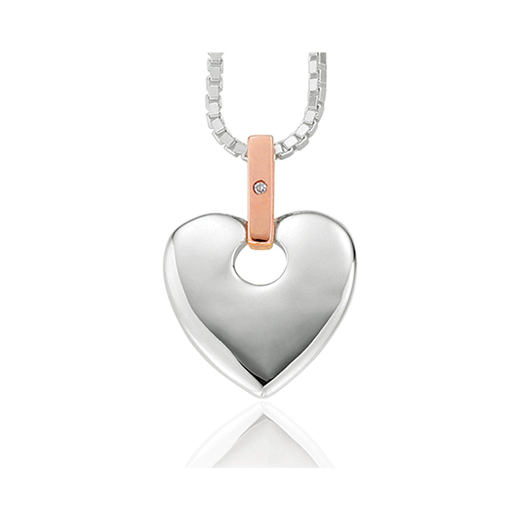 Sterling silver Clogau heart pendant on chain. Features rose gold accent with diamond; romantic fine jewelry gift.