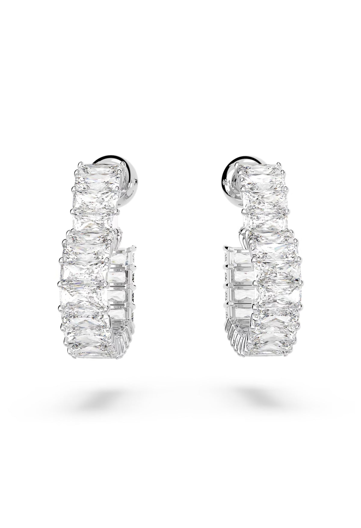 The Swarovski Matrix Small Heart Hoop Earrings, a silver rhodium-plated metal earrings from Swarovski, at OD’s Jewellers in St Helens