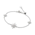 Silver bracelet with star charms.
