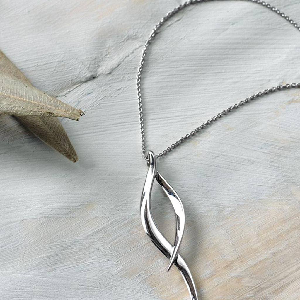 The Kit Heath Entwine Twine Twist Necklace, a silver metal necklace from Kit Heath, available at OD’s Jewellers in St Helens.