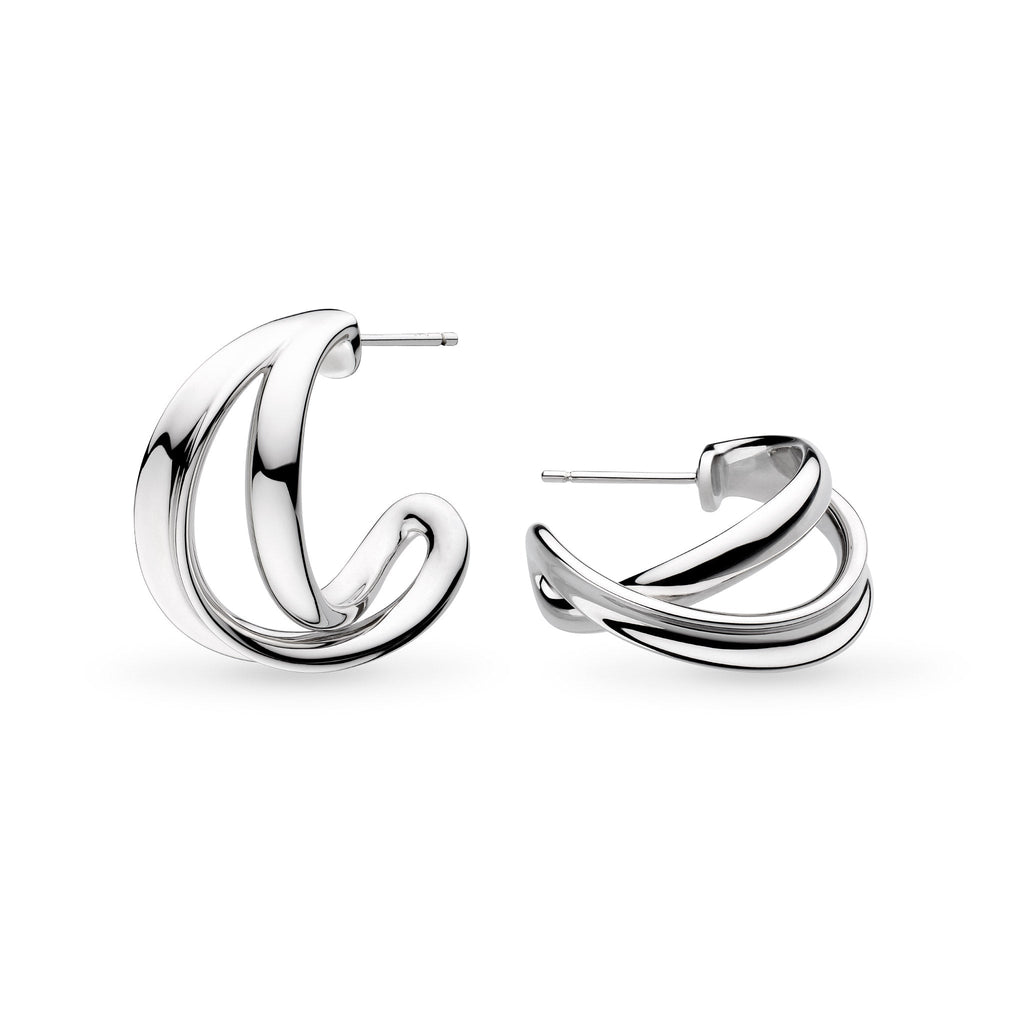 The Kit Heath Serenity Grande Cross Over Semi Hoop Earrings, a silver earrings from Kit Heath, available at OD’s Jewellers in St Helens