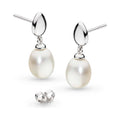 Sterling silver pearl drop earrings, showcasing design details. Elegant jewelry by Kit Heath Coast Pebble collection.