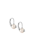 Cream pearl earrings by Vivienne Westwood, platinum plated. Subtle, classic jewelry for everyday wear.