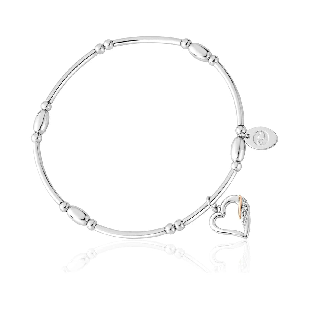Silver Clogau Affinity bracelet with a heart charm, featuring white topaz. Elegant jewelry piece.