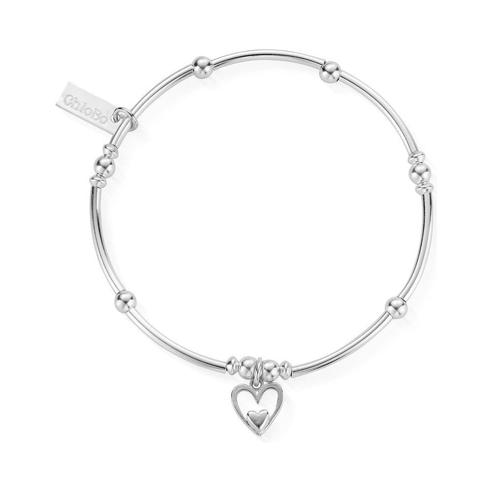 Close-up of the ChloBo Mini Noodle Ball Heart In Heart Bracelet, showcasing the sterling silver design and heart charm