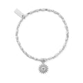 Silver beaded stretch bracelet with a sun charm.
