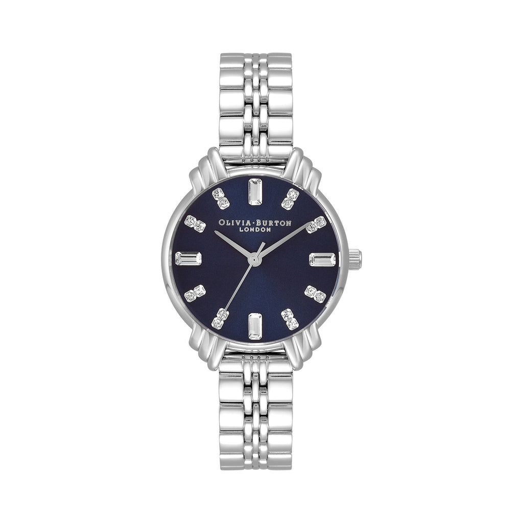Olivia Burton watch showcasing its navy dial, art deco style details, and stainless steel bracelet.