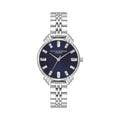 Olivia Burton watch showcasing its navy dial, art deco style details, and stainless steel bracelet.