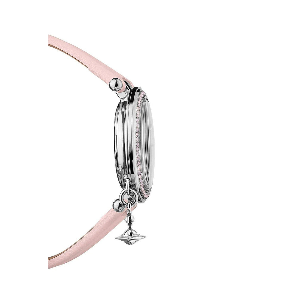 Close-up of Vivienne Westwood watch with a pastel pink strap & signature orb charm. Silver dial with pink crystal detailing.