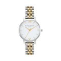 Olivia Burton watch close-up. Shows the dial, silver and gold bracelet, and branding detail.