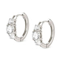 Silver hoop earrings with three cubic zirconia stones, showcasing Nomination's Wave design details. Elegant jewelry.