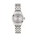 Close-up of the Tissot Classic Dream stainless steel watch featuring a clear view of the watch face & date display.