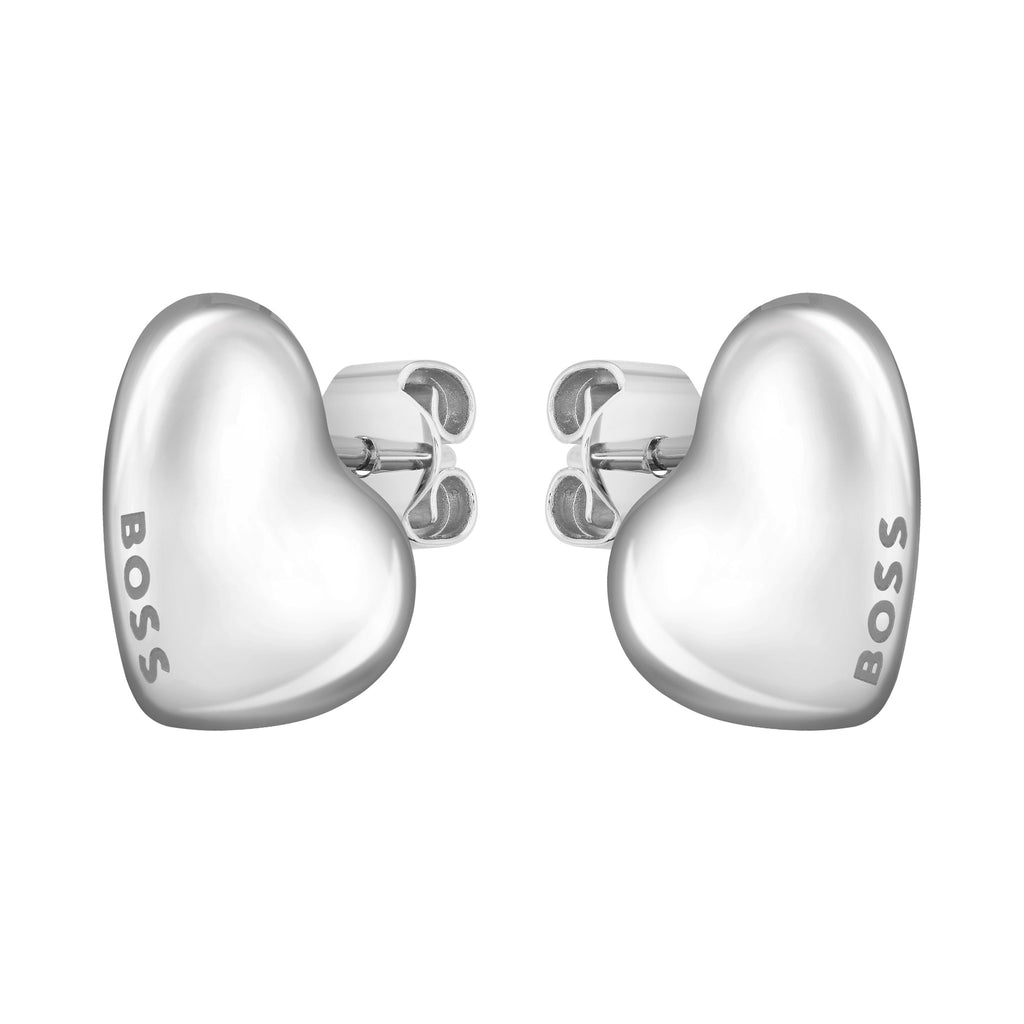 Close-up of BOSS Honey heart stud earrings in stainless steel for women, featuring the brand logo on each earring.