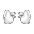 Close-up of BOSS Honey heart stud earrings in stainless steel for women, featuring the brand logo on each earring.