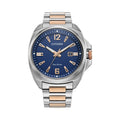 Citizen Eco-Drive watch showcasing blue dial, rose gold accents, and silver band. Close-up for detailed view.