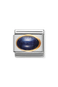 Silver charm with a blue stone and gold trim.