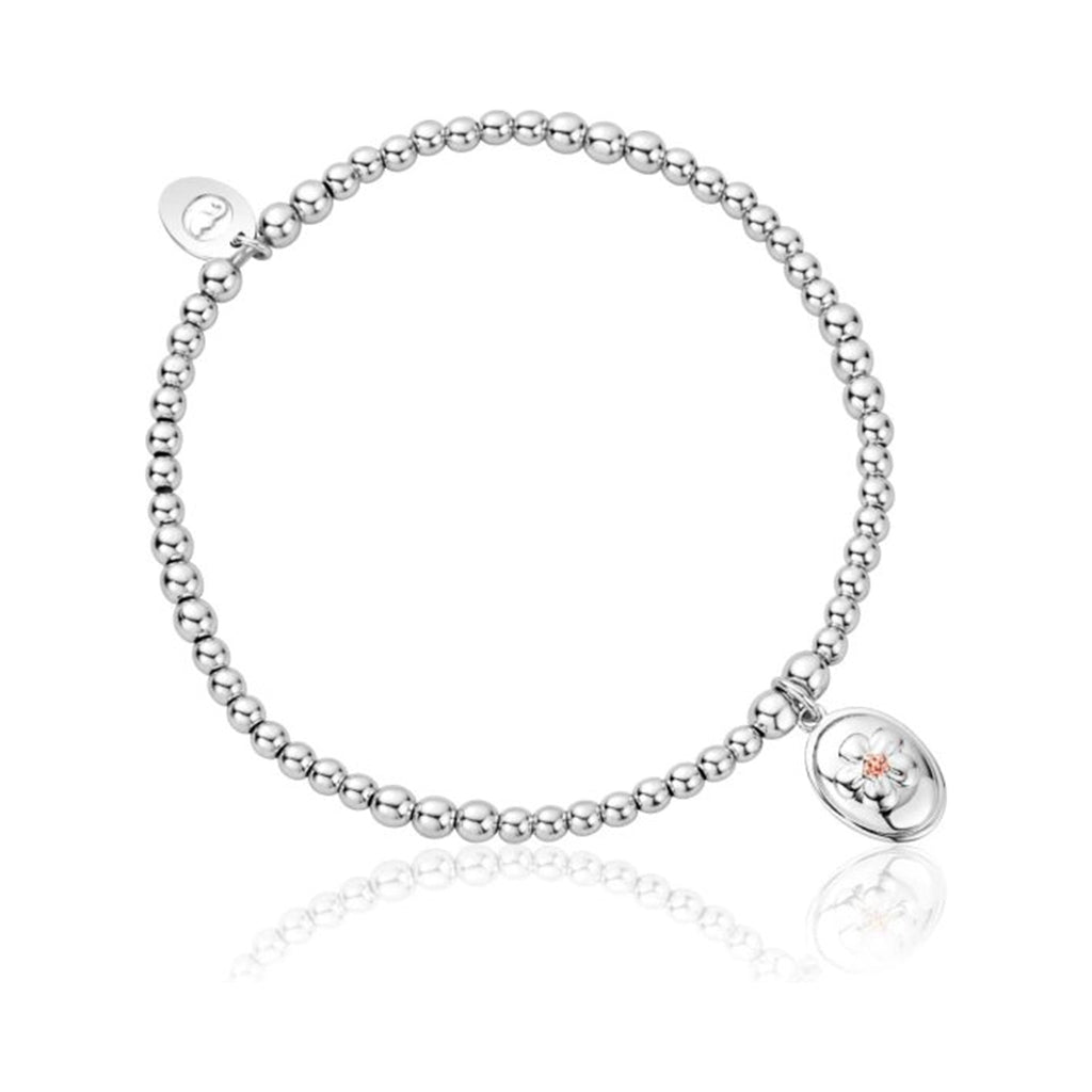 Sterling Clogau bracelet with forget-me-knot charm, showcasing the Nature's Wonder collection.