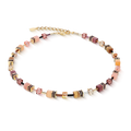 Beaded necklace with square pastel beads and gold chain.
