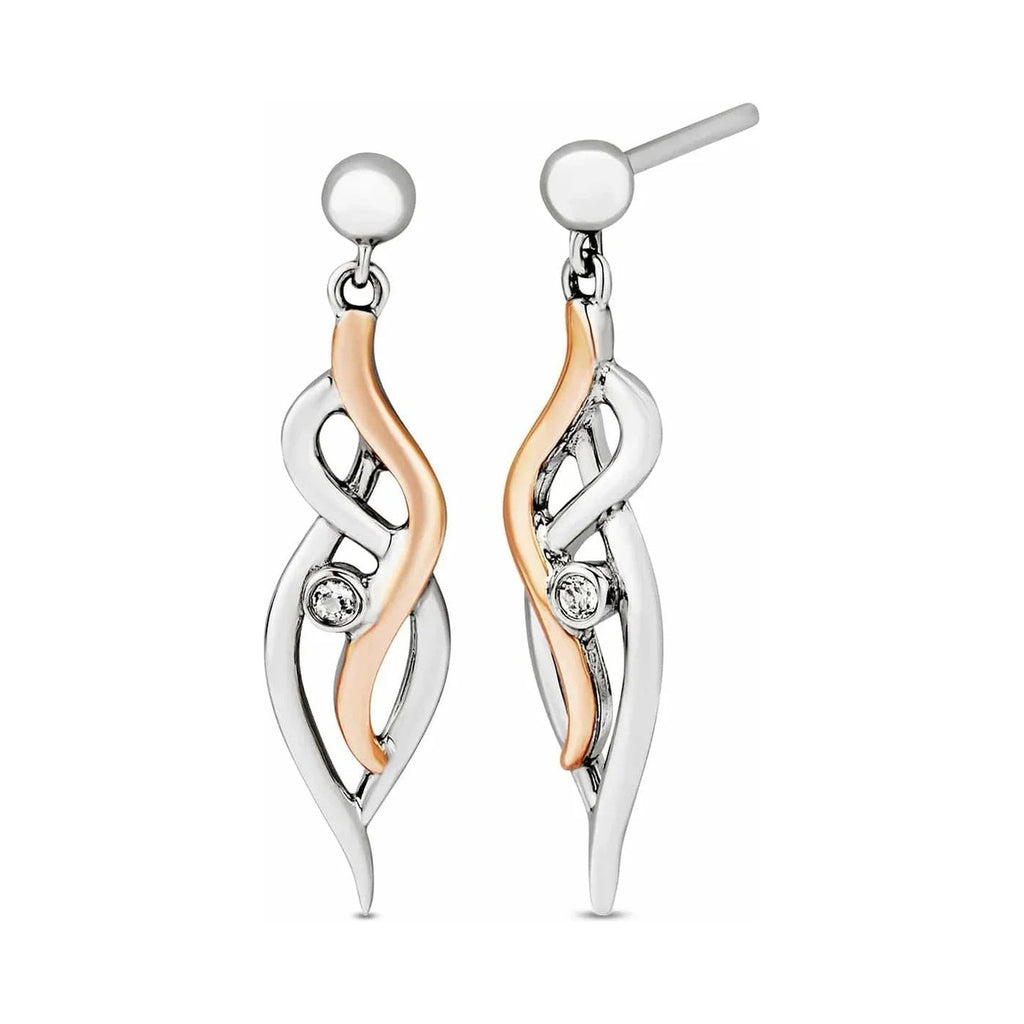 Two-tone drop earrings with gemstones.