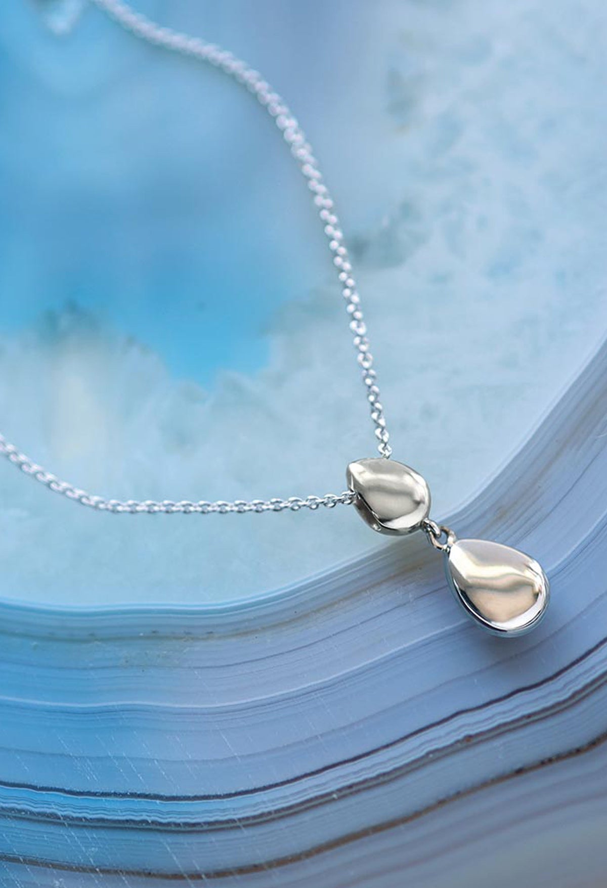 The Kit Heath Coast Pebble Double Droplet Necklace, a silver necklace from Kit Heath, at OD’s Jewellers in St Helens.